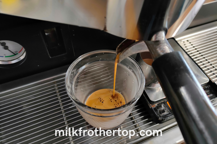 Making espresso for cappuccino
